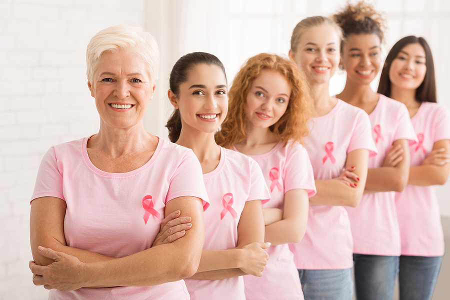 women in pink shirts all ages