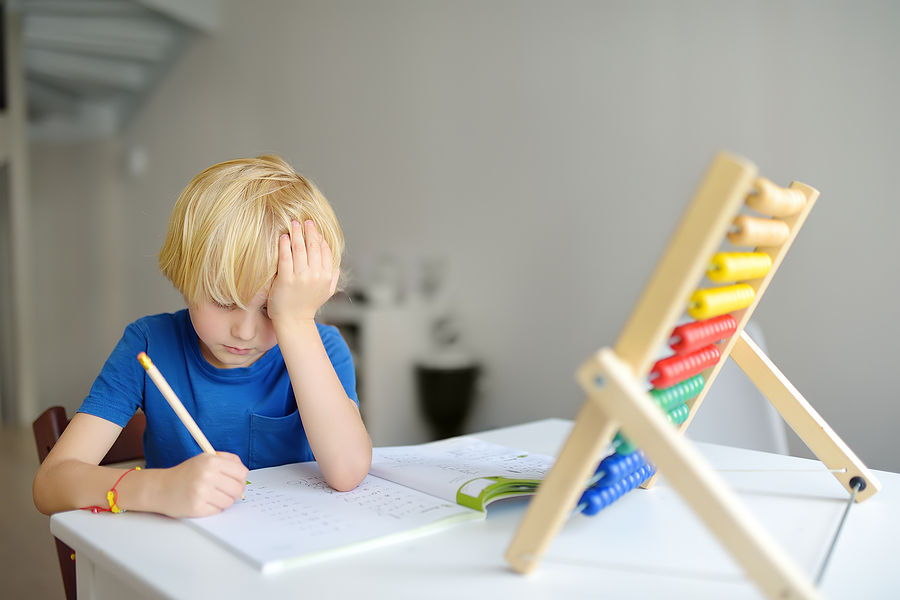 child struggling with school work image
